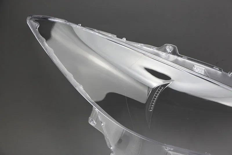 Mazda 3 Exela model headlamp replacement cover with snake glue adhesive.