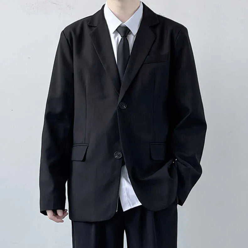 Men's plus size grey suit jacket and trousers set with white shirt and tie on a hanger
