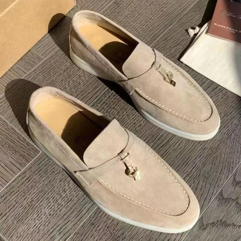 Slip-on loafers with rubber soles, steel toe caps, and artificial PU uppers in multiple colour options