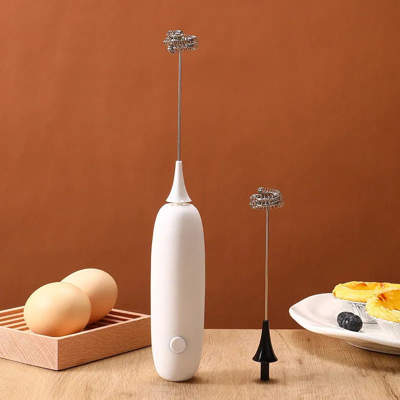 Handheld electric milk frother and blender in modern simple design, shown in black and white colour options.