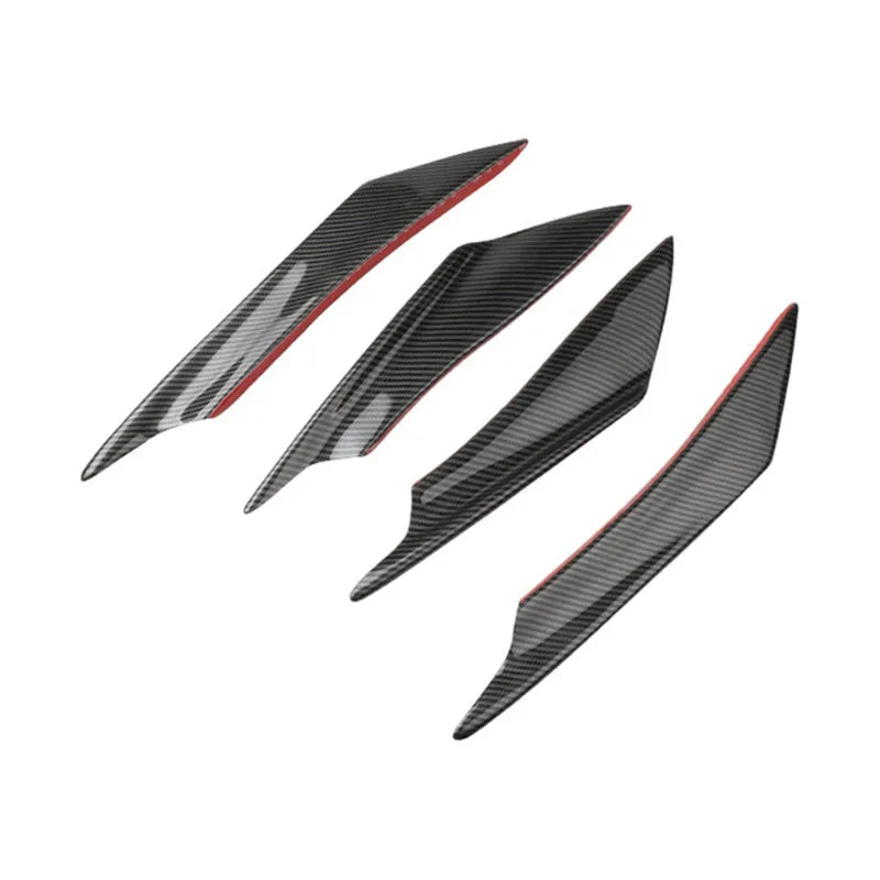 Set of four black carbon fibre pattern ABS plastic air knives for car bumper spoiler installation.