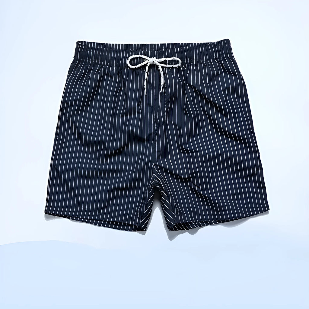 Navy blue striped beach shorts with straight leg opening and triangle lining, flat lay.