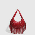 Retro black shoulder handbag with tassel detail showing interior mobile phone compartment and polyester lining