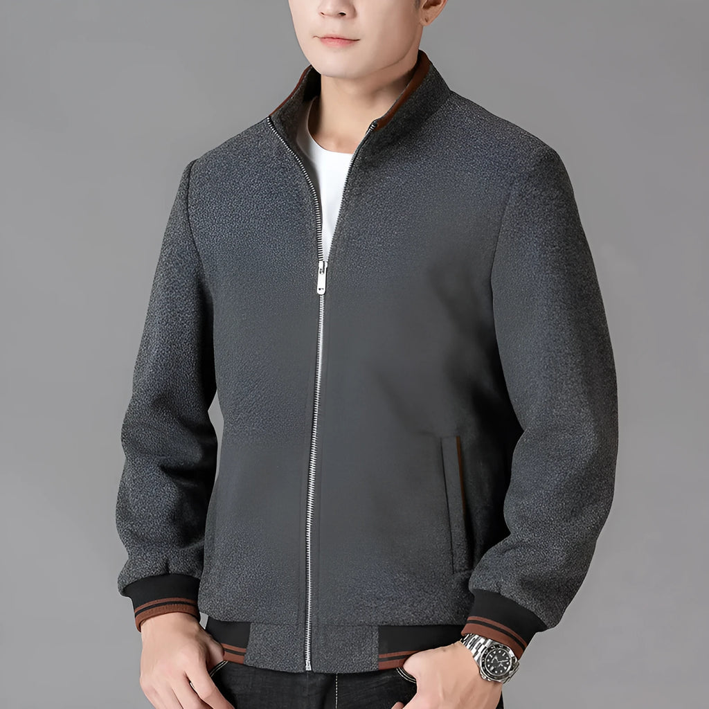 Men's gray fleece sports jacket with long sleeves and a chest pocket.
