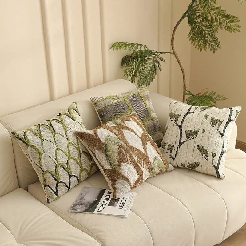 Square Jacquard floral pillow cushion cover in a retro colour, 45cm by 45cm, on a sofa.