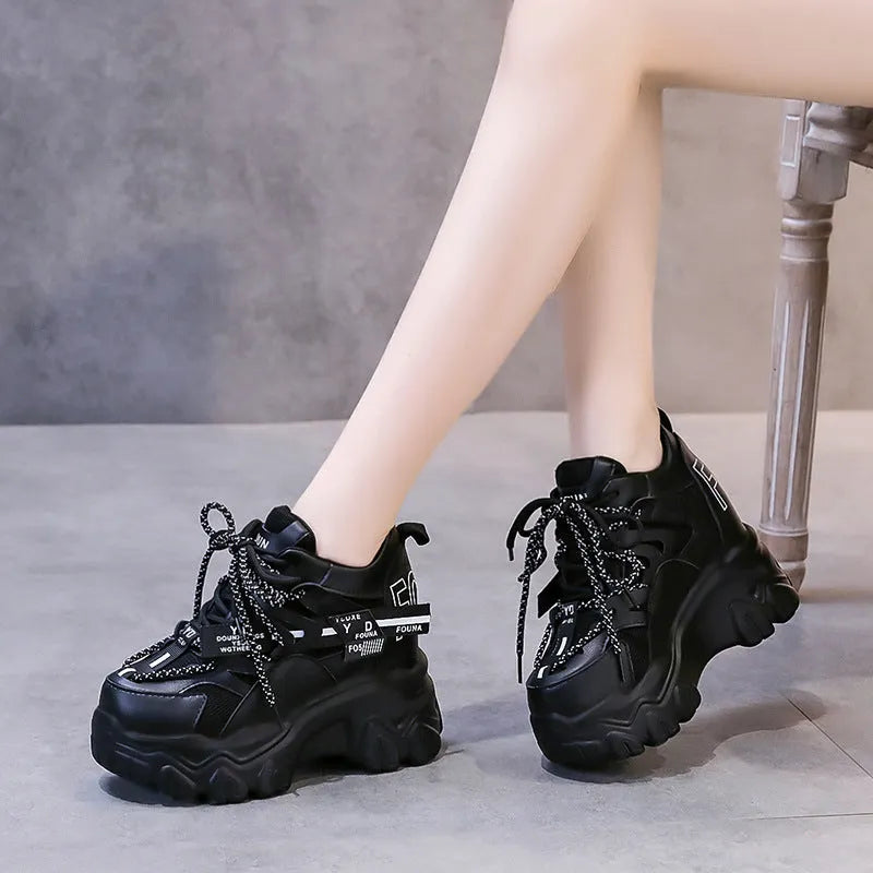 Women's white mesh platform sports shoes with a cross-strap design and rubber sole