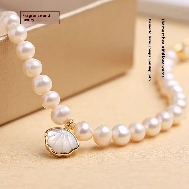 Real natural 5-6mm freshwater pearl bracelet with fan shape design and alloy details on 16cm band