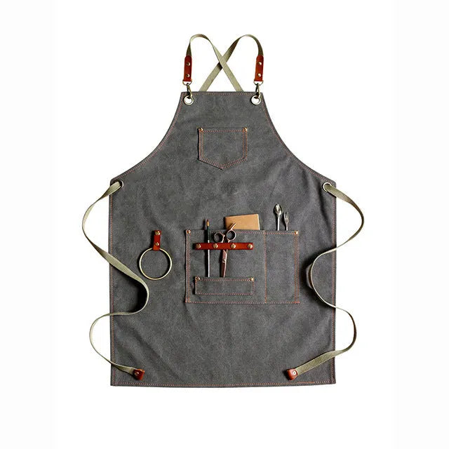 Canvas cross-strap apron in camel colour for cafe or baking work