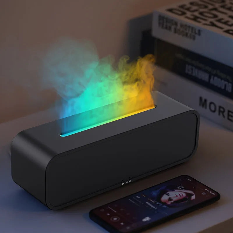 Black cylindrical aroma diffuser with colour-changing LED lights and remote control