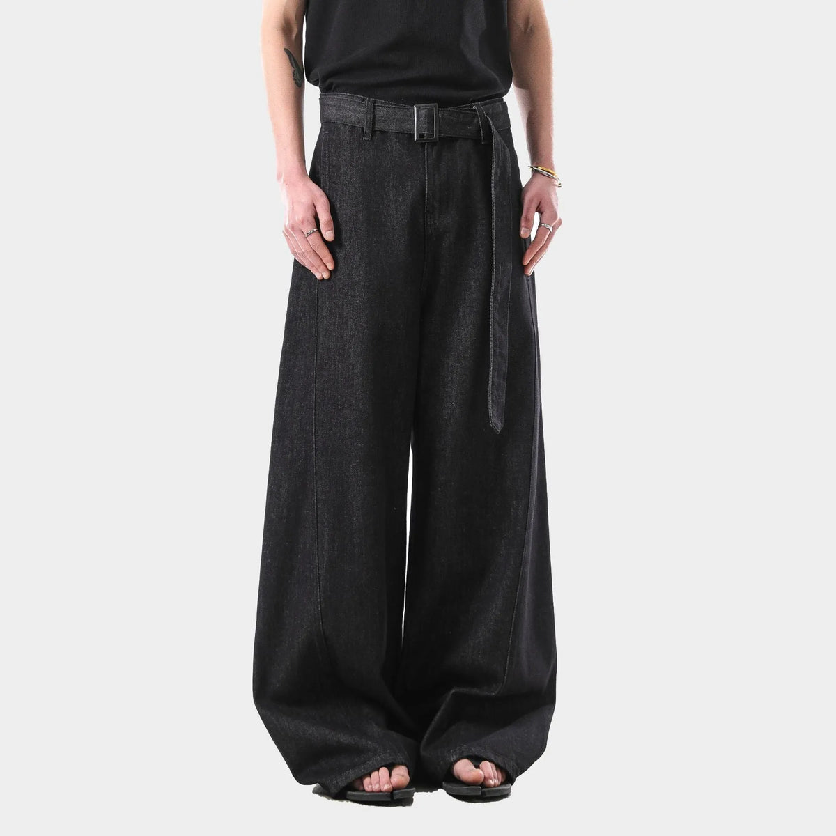 Black American retro high waist straight leg jeans on a model, showing the zip fly and straight cut.