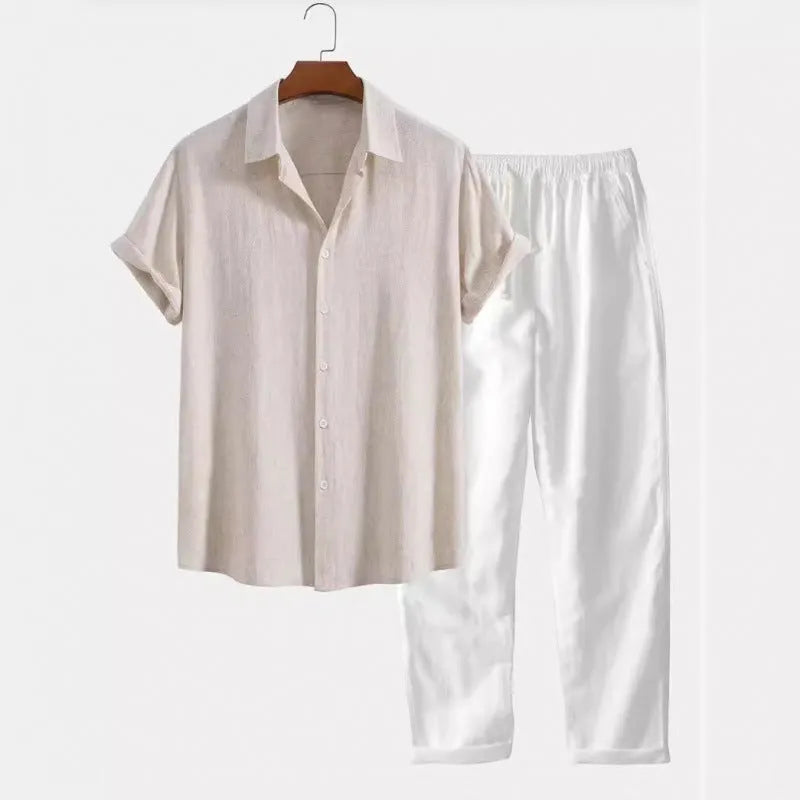 Man wearing a loose-fit short sleeve shirt and matching trousers from a casual linen-look two-piece set.