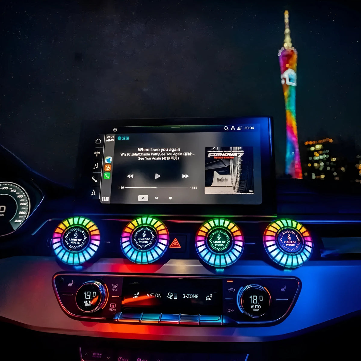 Car air outlet aromatherapy diffuser with RGB rhythm lighting mounted on car vent