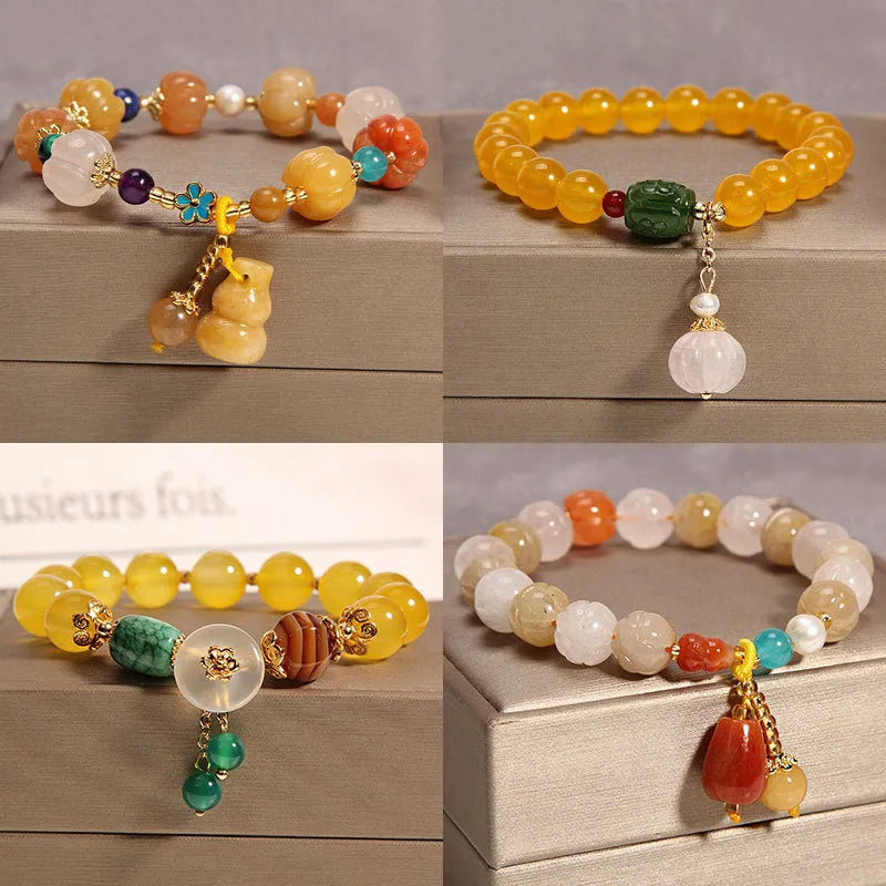 Women's yellow agate crystal bracelet on a gold silk cord, khaki colour.