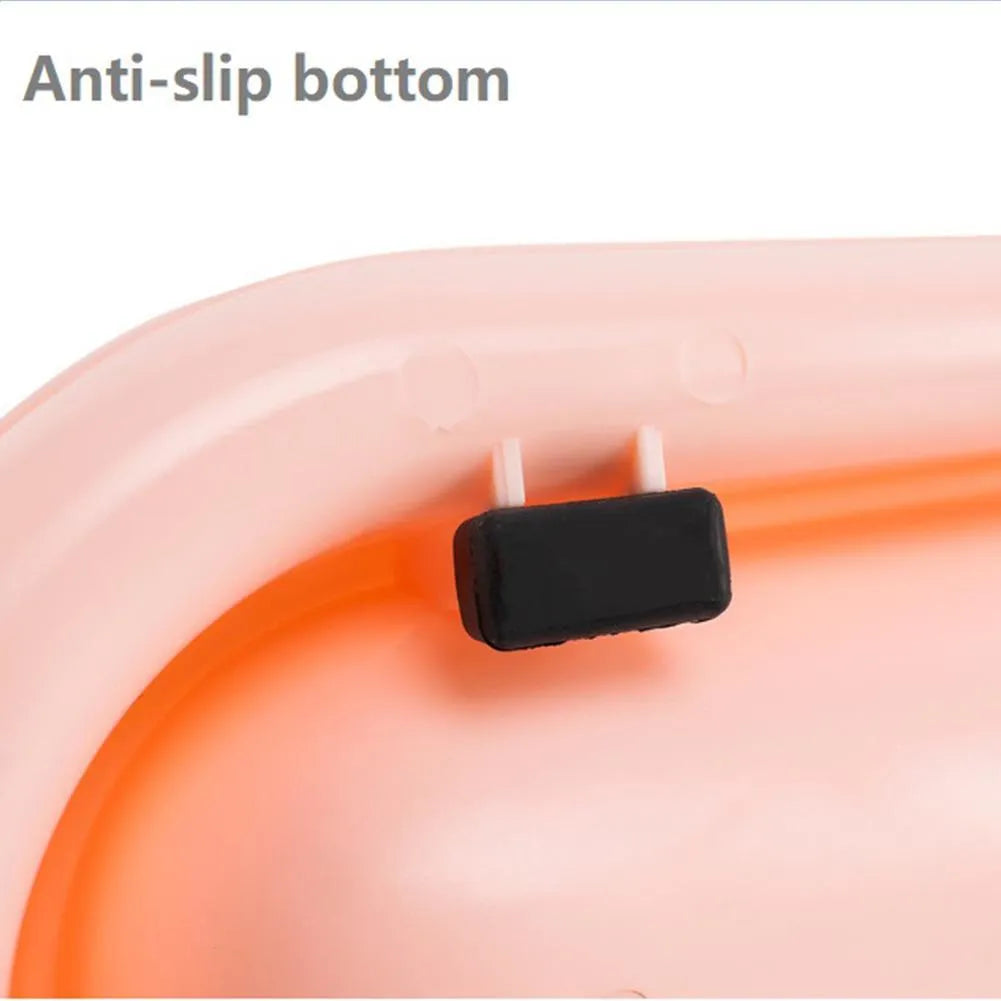 Green plastic pet feeder with separate food and water bowls for multiple small dogs or cats.