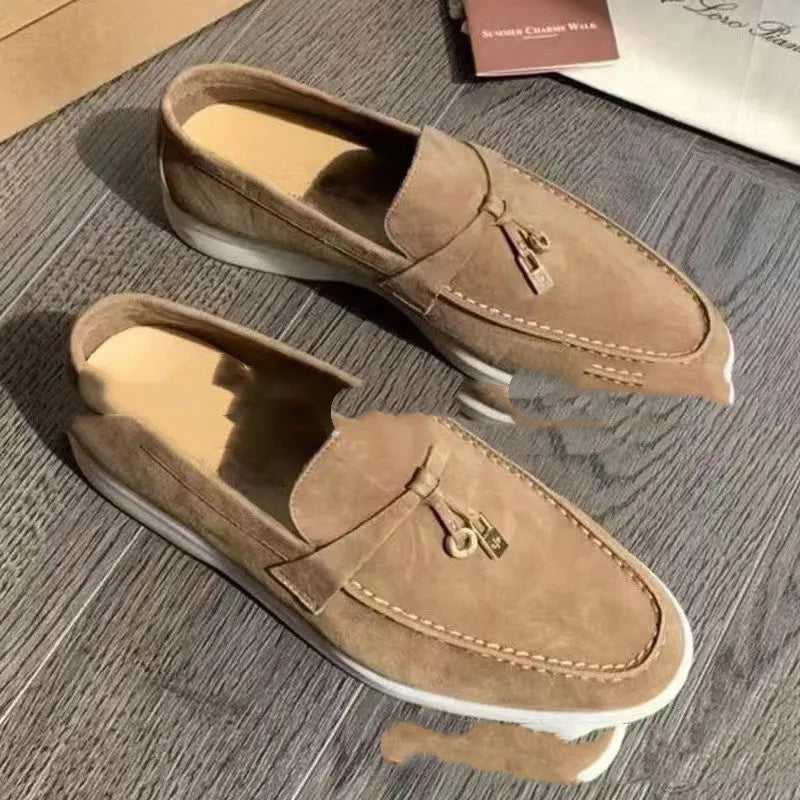 Slip-on loafers with rubber soles, steel toe caps, and artificial PU uppers in multiple colour options