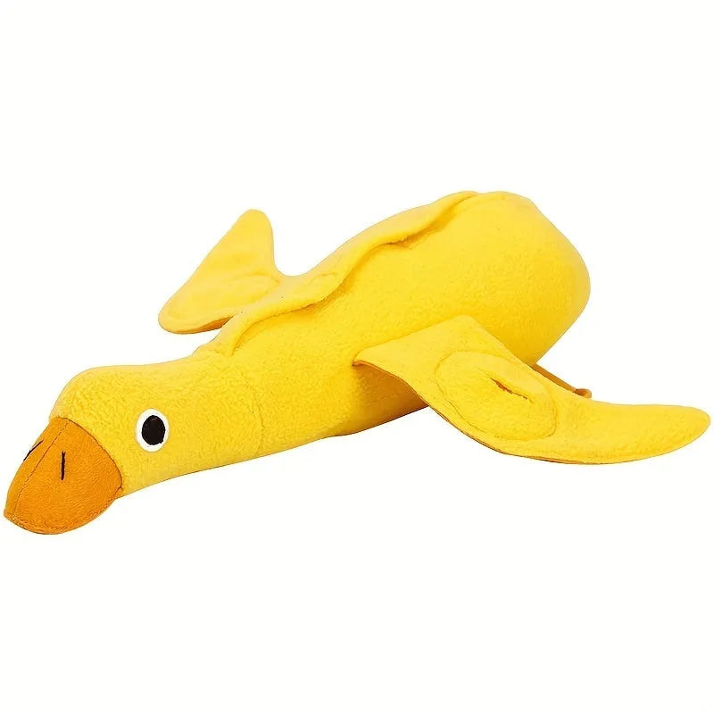 Yellow plush duck dog toy with squeaker and food leak compartment for treats.