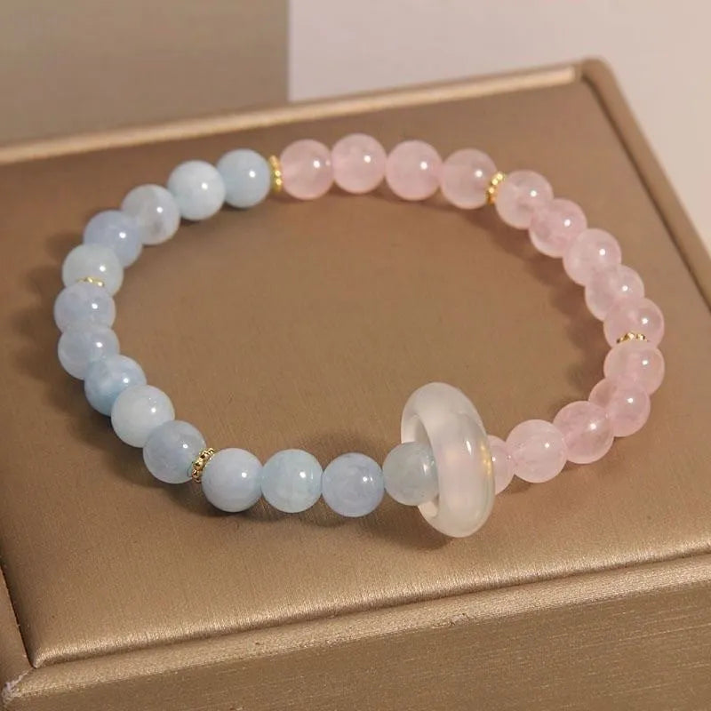 Women's aquamarine crystal bracelet set with dopamine pink and blue colour options and geometric design