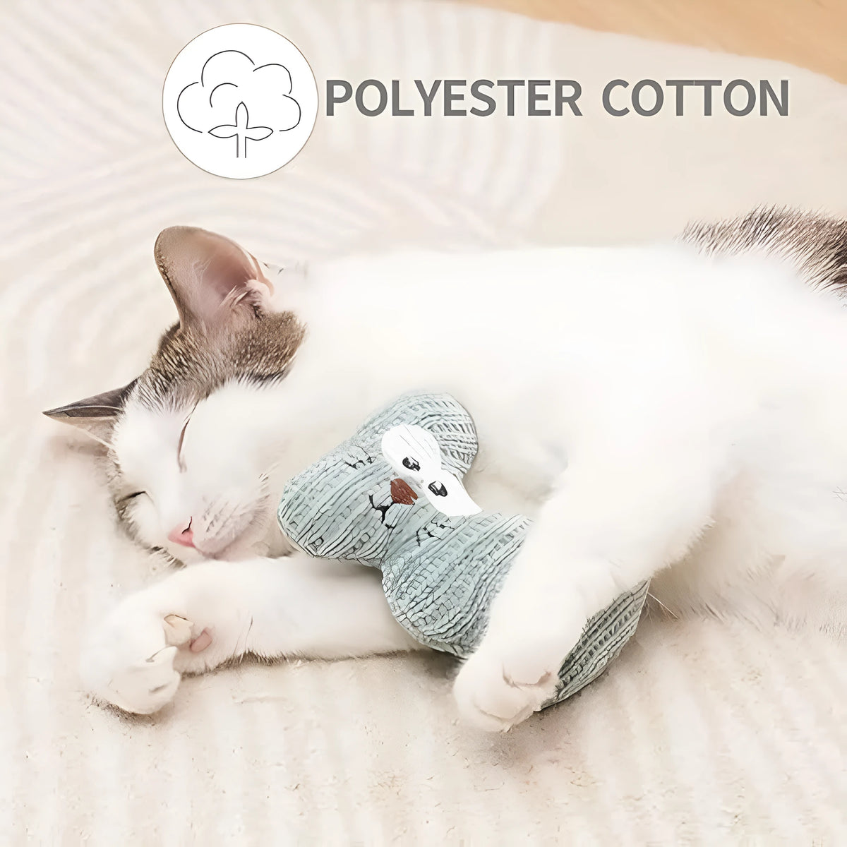 Cyan and light coffee coloured knitted plush cat toy with bell and catnip, shown next to a ruler showing 12cm length.