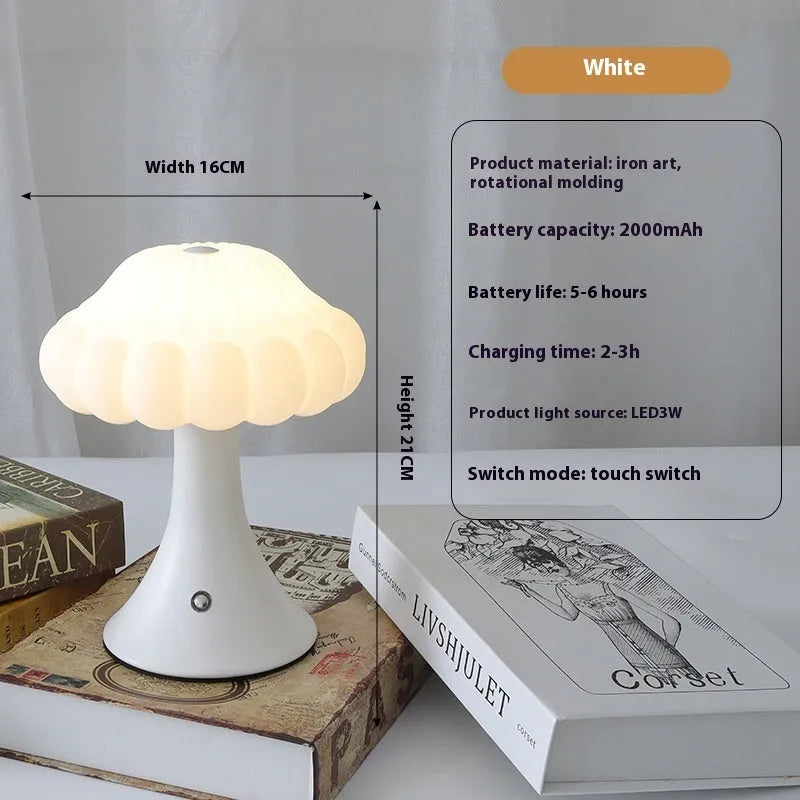 Wood grain coloured mushroom-shaped touch night lamp on a wooden table.