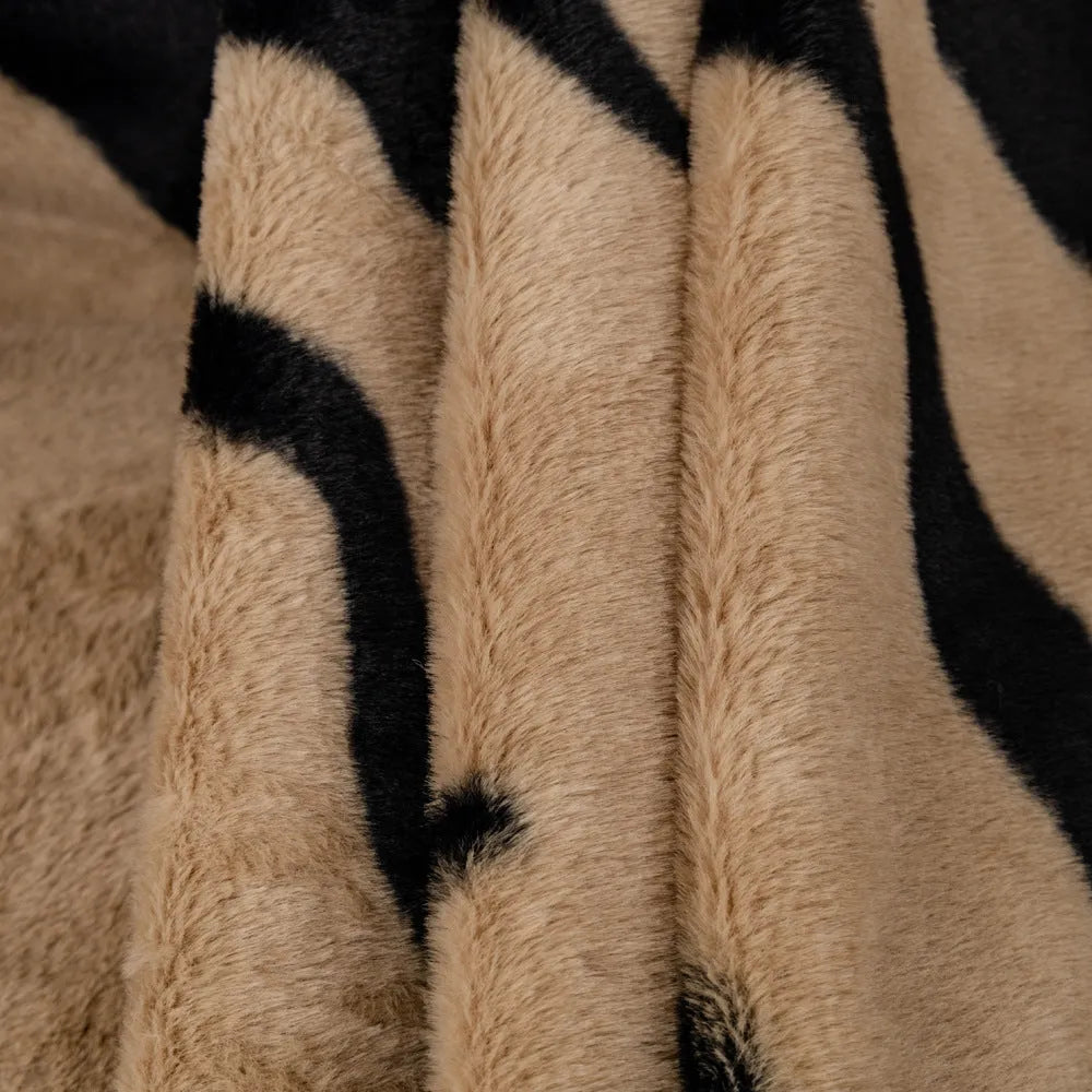Zebra pattern thickened flannel sofa cover shown in caramel colour with matching pillowcase, demonstrating non-slip fit.