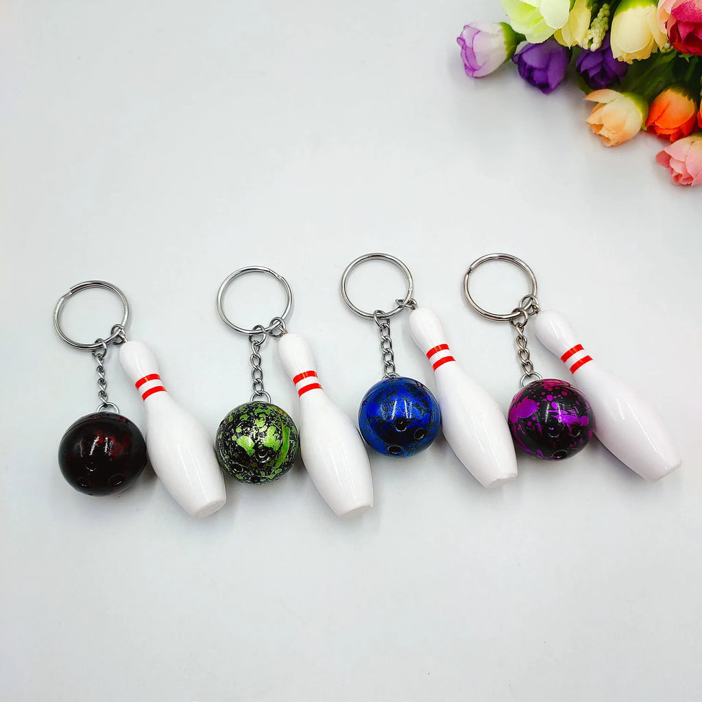 Mini simulation bowling keychain pendant in PVC metal showing four colour options