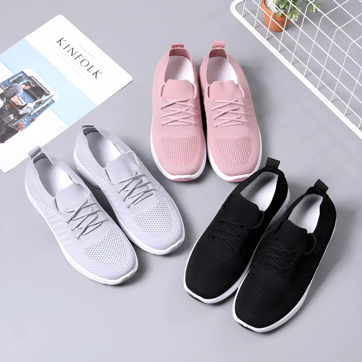 Women's round-toe lace-up sneaker in grey mesh with a soft PVC sole.
