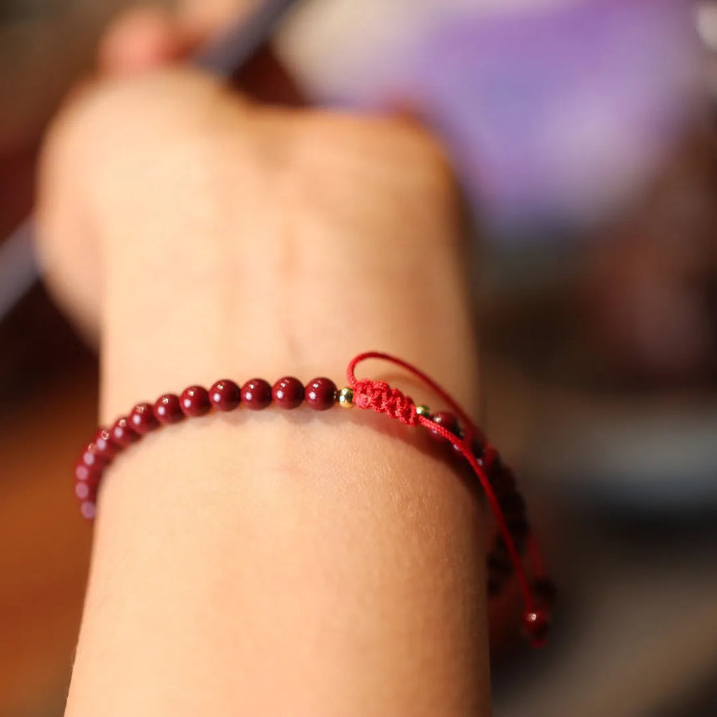 Natural cinnabar bracelet with purple gold sand design and geometric Chinese auspicious patterns