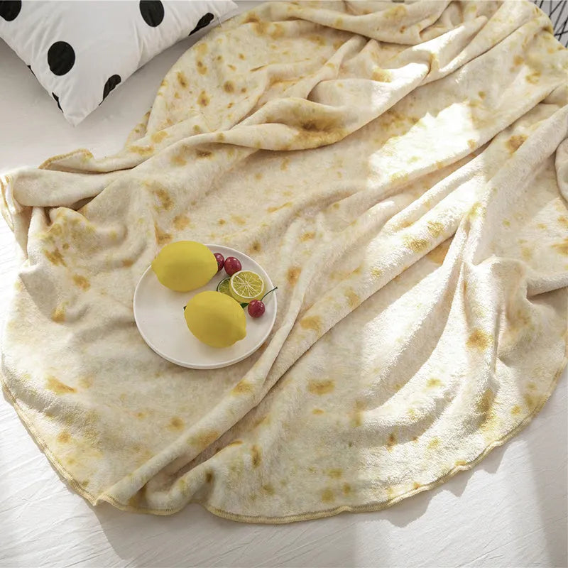 Round coral fleece burrito blanket with a food-themed print, shown folded.