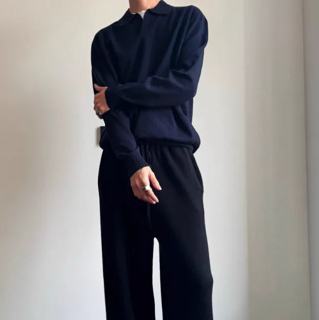 Pure wool polo sweater with lapel collar in loose fit, shown in milky white