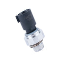 Silver automobile fuel pressure sensor for petrol engine diagnostic testing.