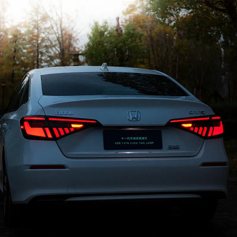 Black and red LED tail light assembly for 11th Generation Honda Civic.