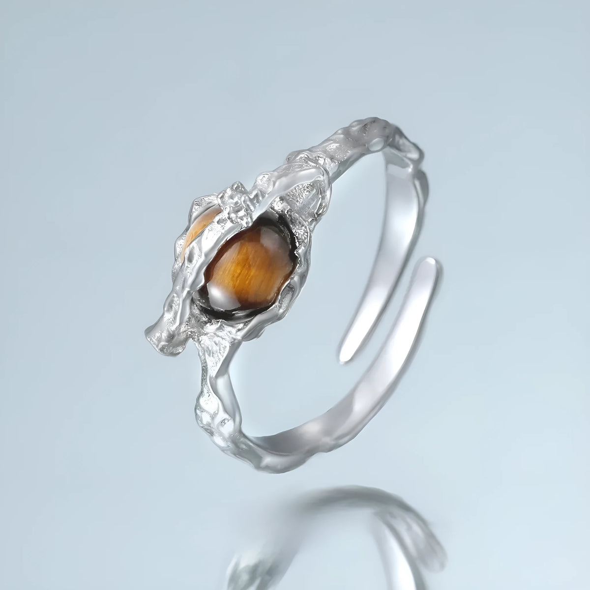 Women's adjustable Saturn open ring in white gold colour on silver.