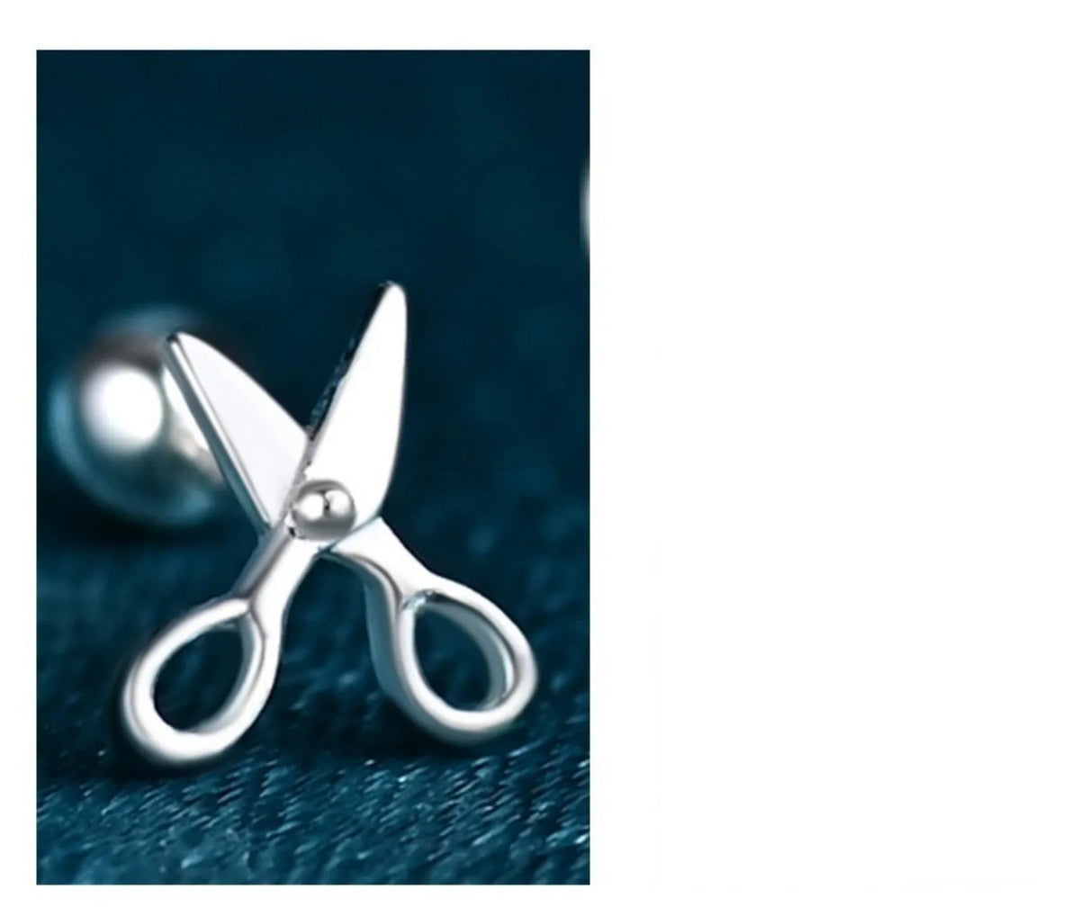 A pair of pure silver earrings with a miniature scissors design and screw-on backs.