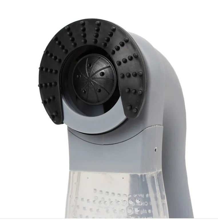 Grey portable electric pet hair vacuum cleaner with grooming brush.