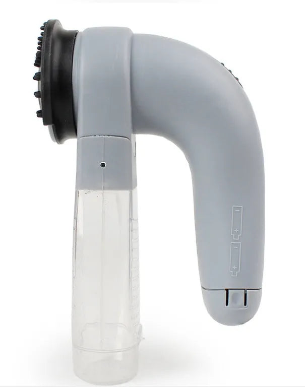 Grey portable electric pet hair vacuum cleaner with grooming brush.
