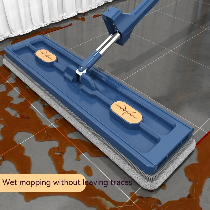 Large blue flat mop with long stainless steel handle and 360-degree rotating head on a hard floor