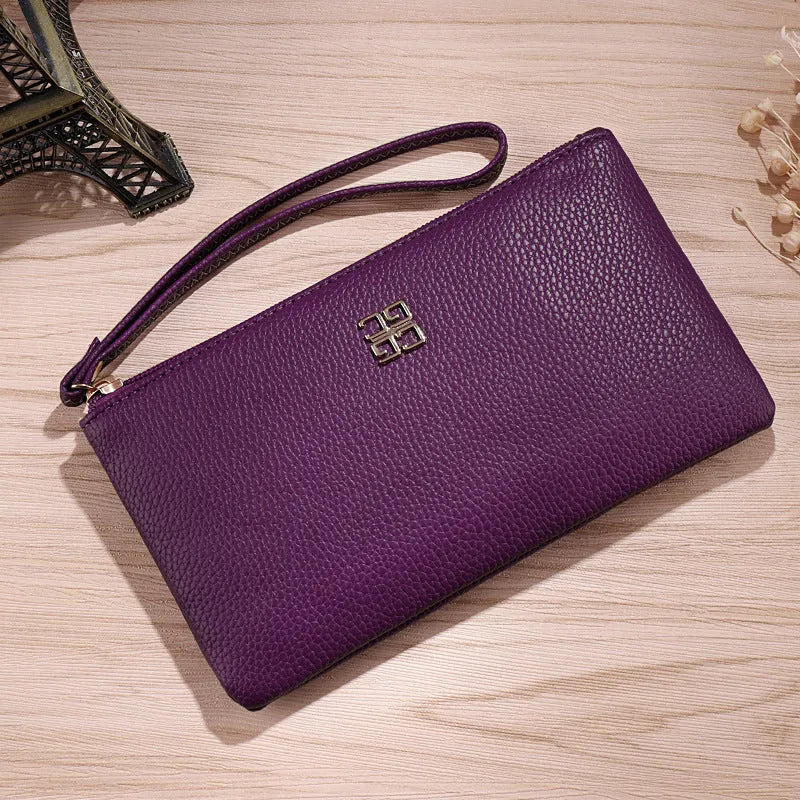 Long 55-inch PU leather phone wallet handbag with zip closure in a solid colour