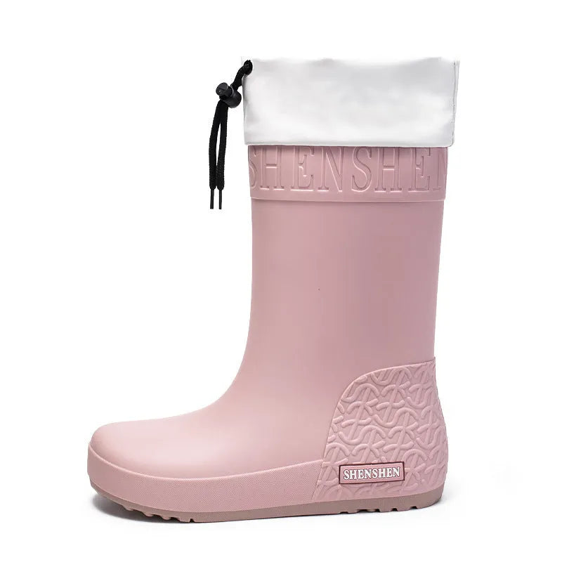 Women's solid colour PVC rain boots with a non-slip sole.