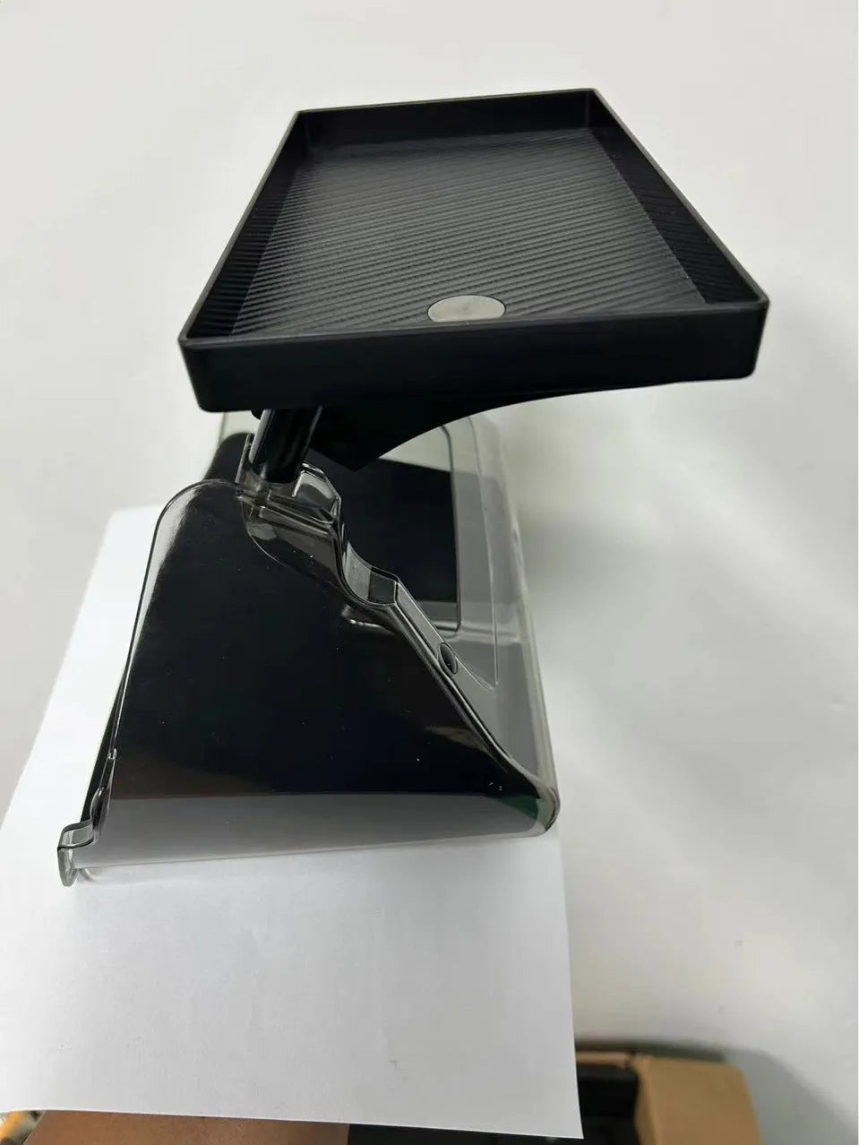 Black ABS plastic storage box for under the Tesla Model 3 and Y centre console screen.