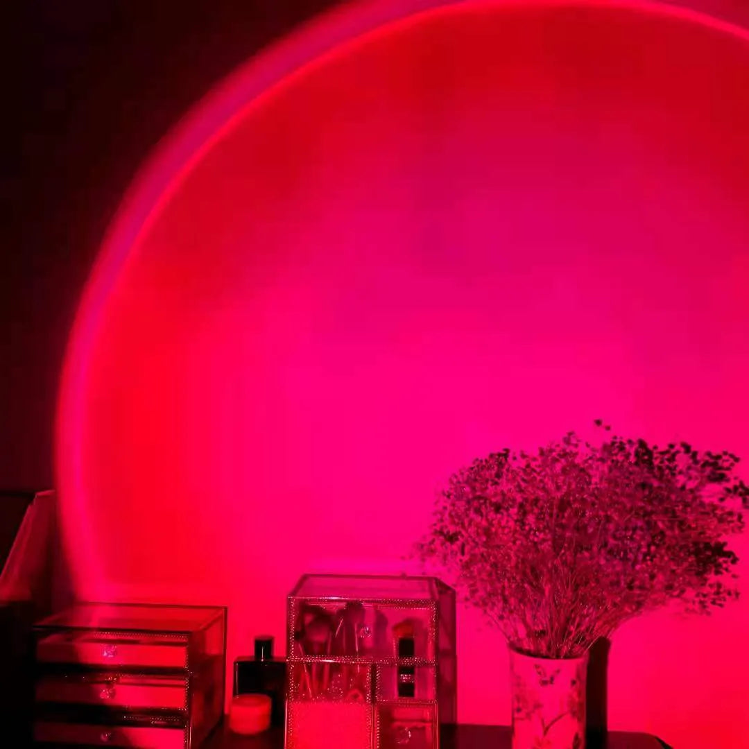 Rechargeable rainbow projection lamp showing sunset red colour effects
