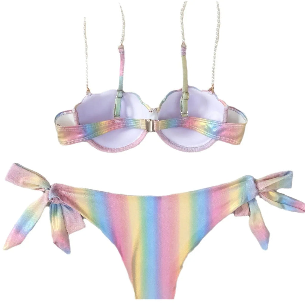 Women's shell rainbow colour split tied bikini swimsuit with triangle top on a neutral background.