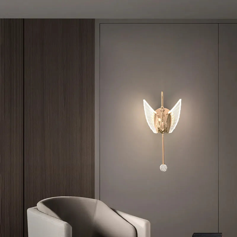 Gold-finish iron swan bedside wall lamp with acrylic shade and dimmable LED light.