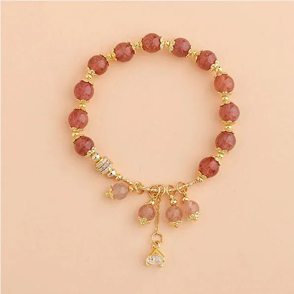 Pink crystal women's bracelet with heart-shaped strawberry quartz beads and natural pearl accents