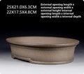 Handmade purple sand ceramic bonsai flower pot with antique oval shape measuring 25x21x6.3cm