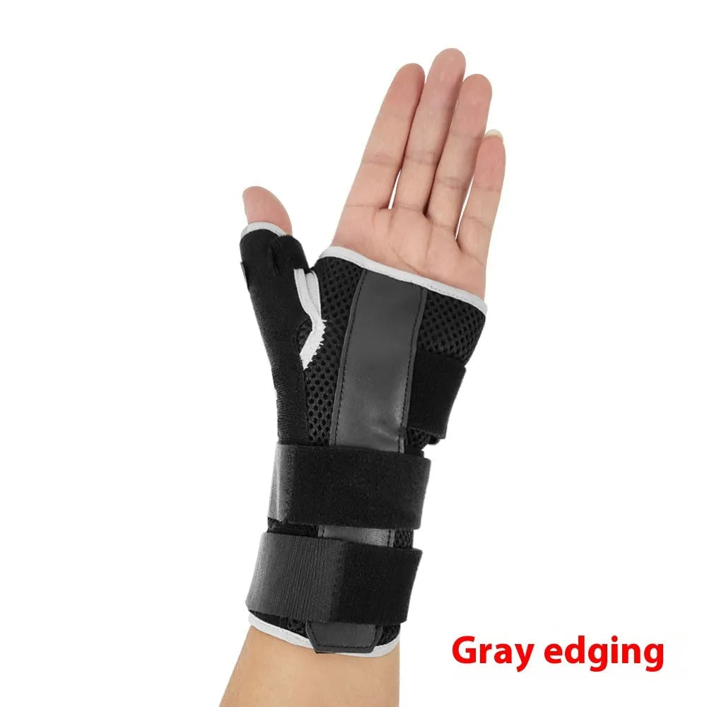 Black sports wrist guard with carbon fibre panel and grey thumb strap for left hand support