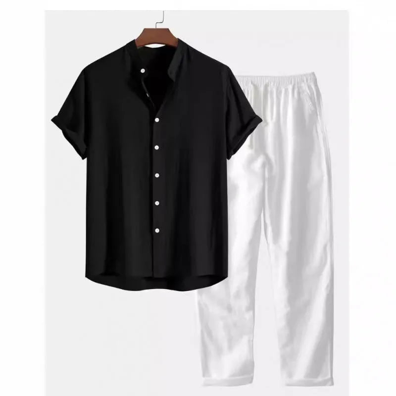 Man wearing a loose-fit short sleeve shirt and matching trousers from a casual linen-look two-piece set.