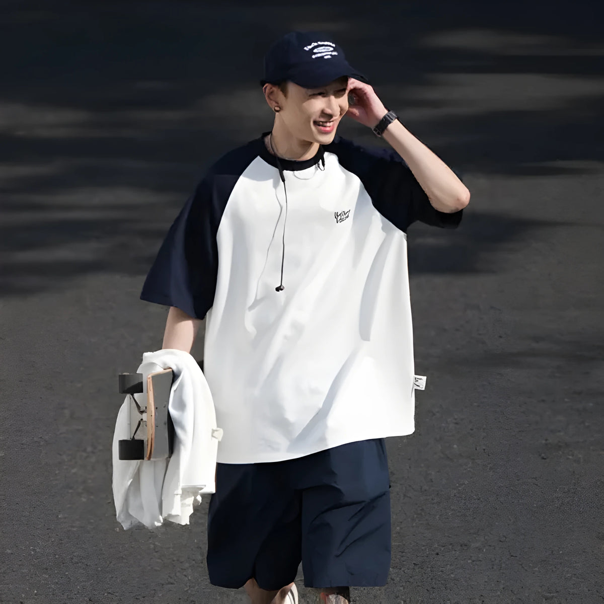 Men's blue Japanese-style raglan sleeve t-shirt with loose fit on hanger