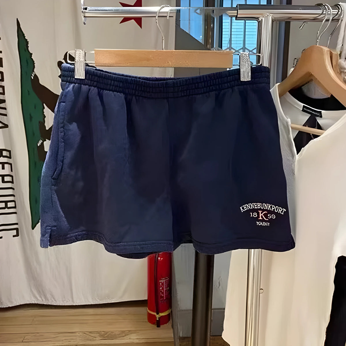 Dark blue cotton women's shorts with white flag embroidery and navy detailing in free size