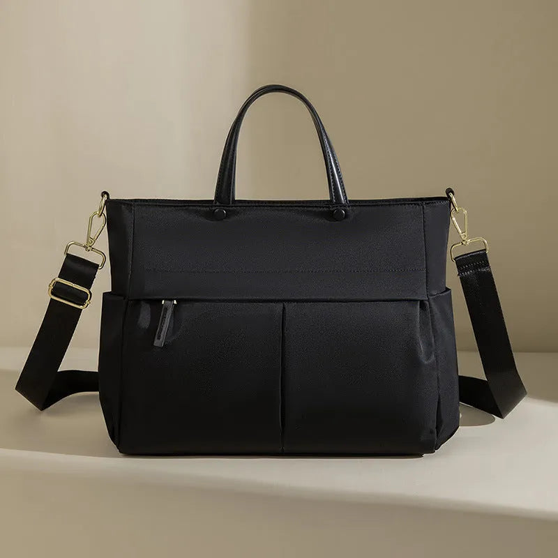 Women's Oxford cloth laptop briefcase in black colour with open outer pocket
