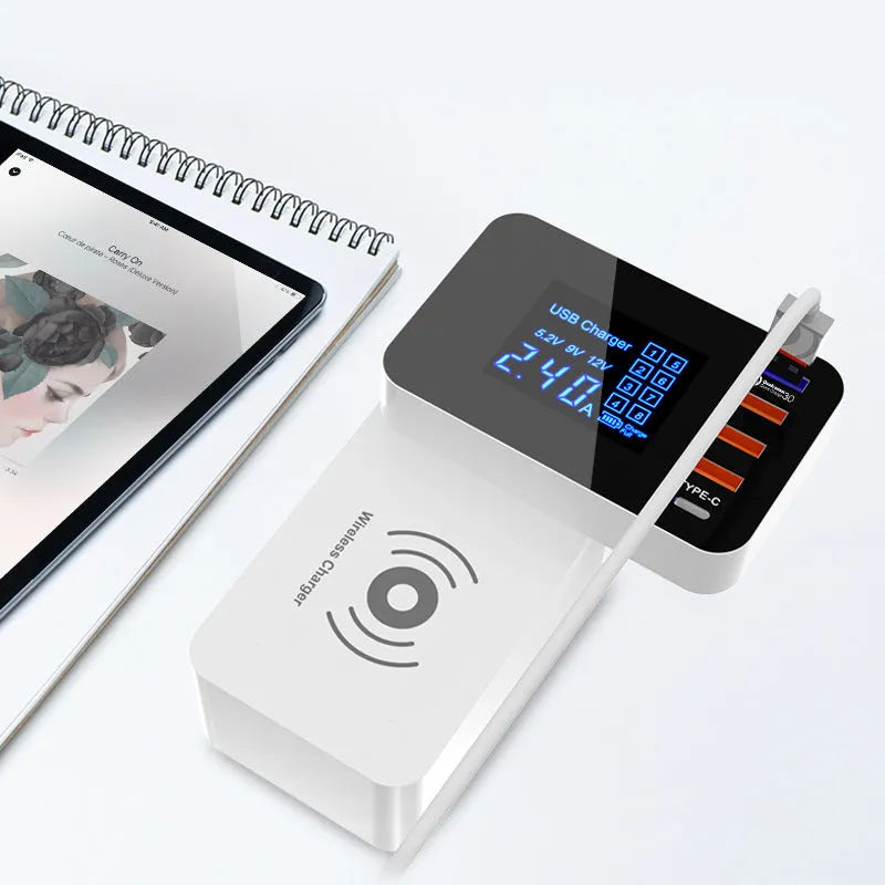 White multi USB port fast charger with built-in 10W wireless charging pad, plug adapters, and cable.
